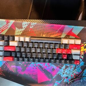 Compact Mechanical Keyboard with Black, Gray and Red Keycaps